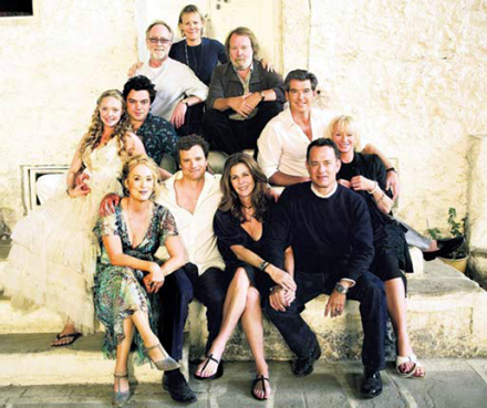 Back row: Producer Gary Goetzman, Director Phyllida Lloyd, Benny Andersson. Middle row: Amanda Seyfried, Dominic Cooper and Pierce Brosnan and producer Judy Craymer. Front: Meryl Streep and Colin Firth with producers Rita Wilson and Tom Hanks.