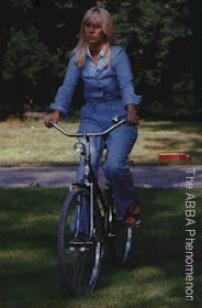 Agnetha riding a bike